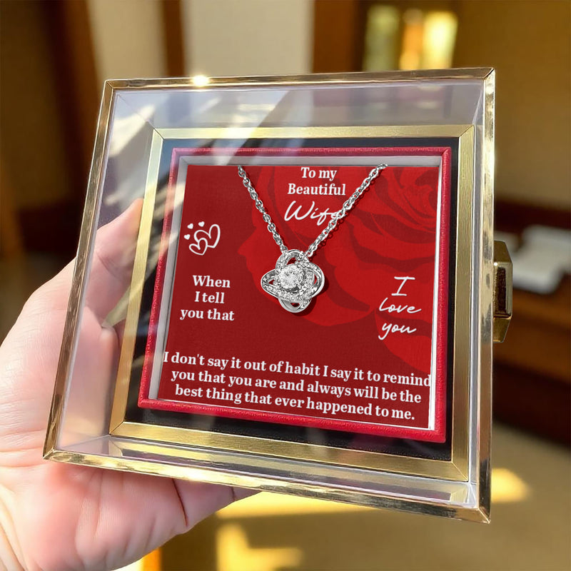 She Laughed, Then Cried... 14ct White Gold Love Knot Necklace with Rotating Rose Gift Box
